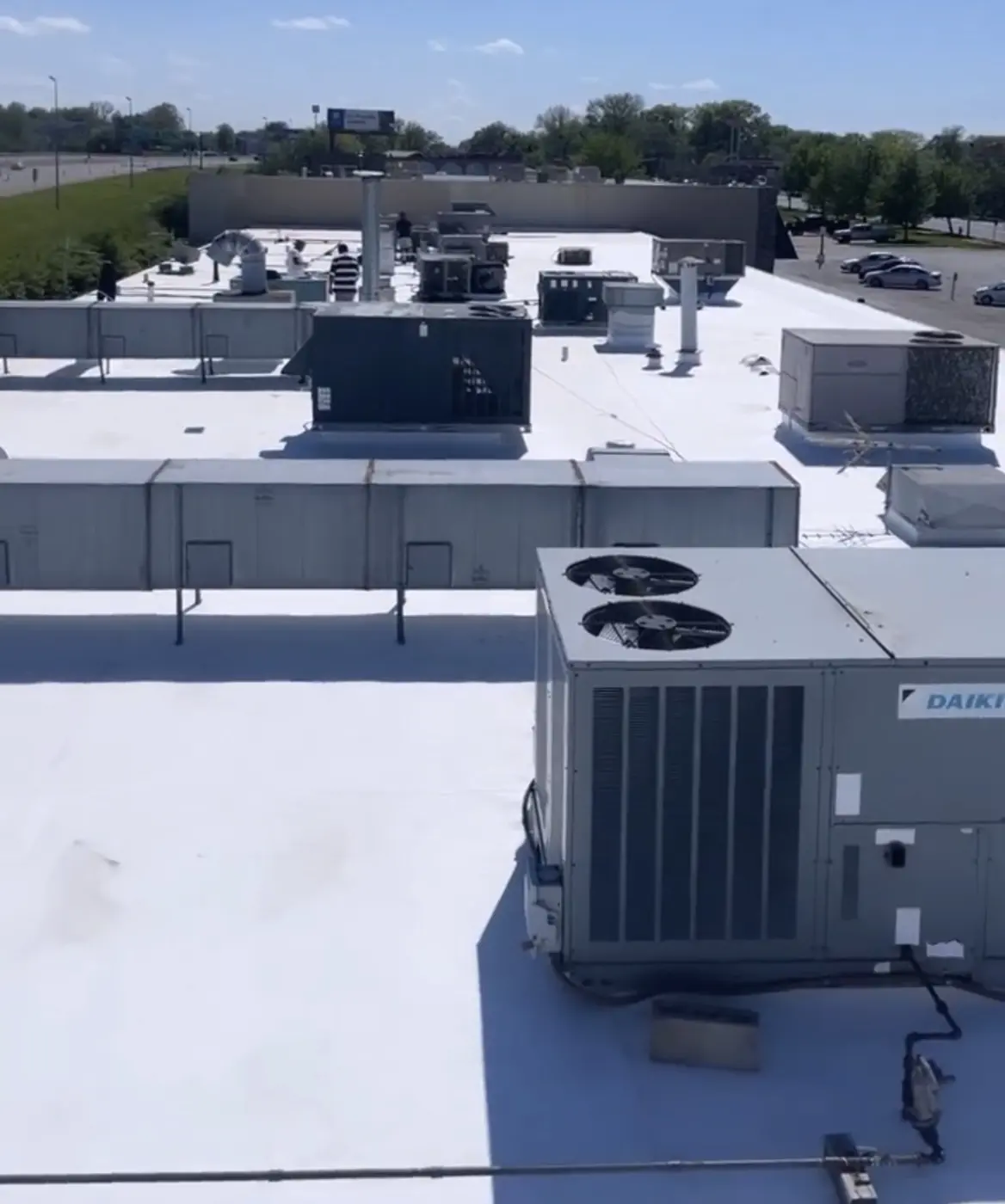 New TPO roof around rooftop HVAC units